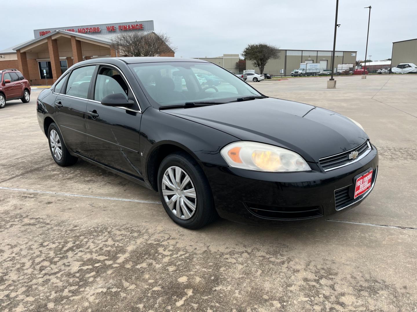 2008 Black /gray Chevrolet Impala LS (2G1WB55K381) with an 3.5L V6 OHV 16V FFV engine, 4-Speed Automatic Overdrive transmission, located at 14700 Tomball Parkway 249, Houston, TX, 77086, (281) 444-2200, 29.928619, -95.504074 - Photo#0